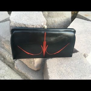 Vintage 1950’s pinstriped clutch.